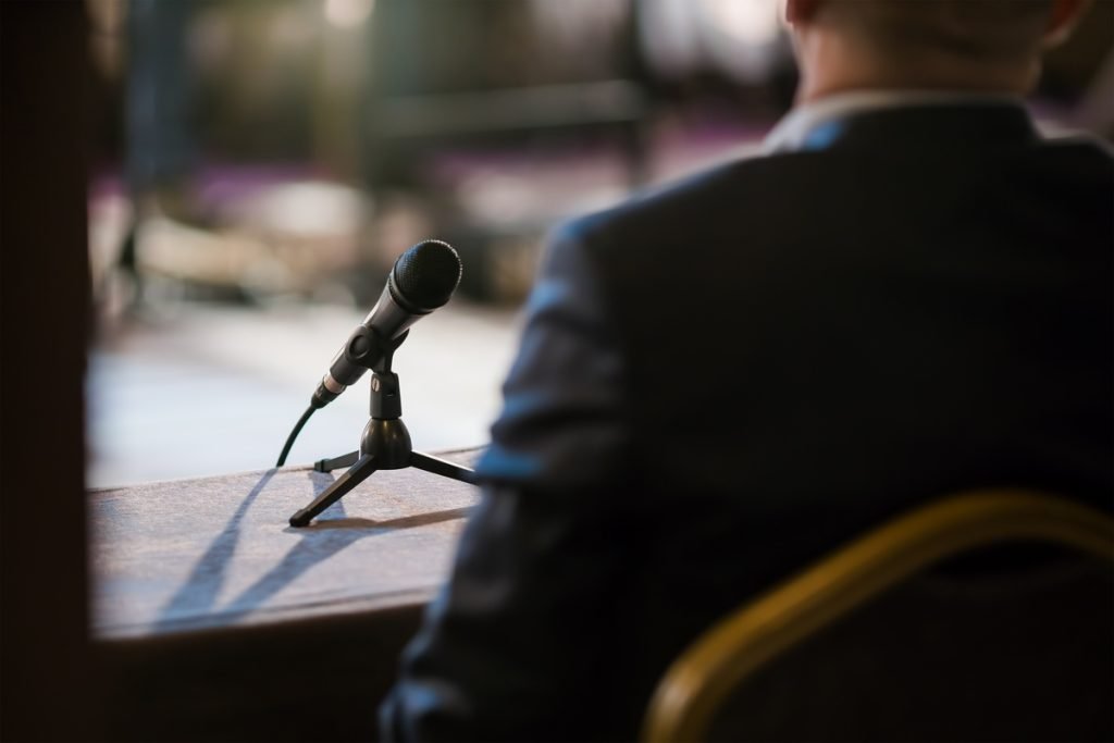 man giving statement in court during interrogation